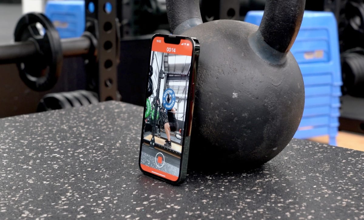 The Metric VBT app recording while resting against a Kettlebell