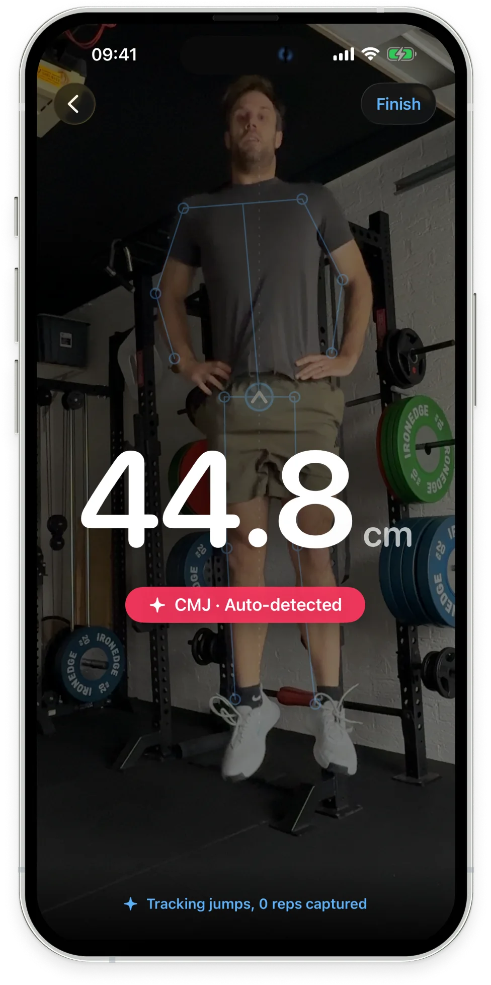 Metric Jump measuring a countermovement jump live — 44.8 cm shown mid-air, the athlete tracked by an on-screen skeleton overlay and the jump auto-detected as a CMJ.